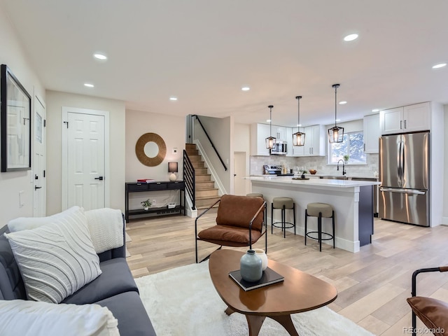 living room featuring light wood-type flooring