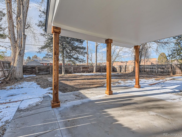 view of snow covered patio