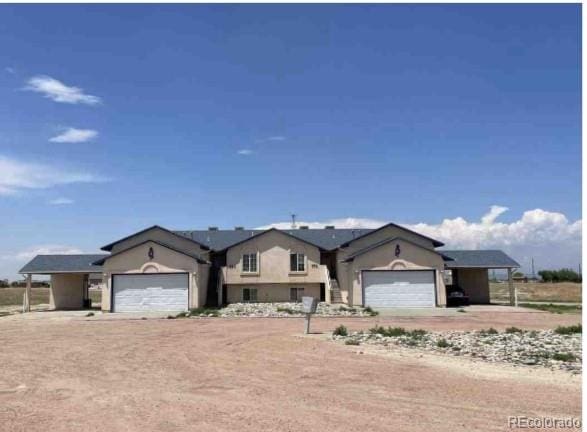 view of front of house with a garage