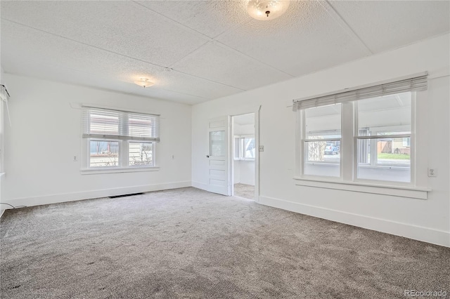 4835 Harlan St, Wheat Ridge, CO 80033 - carpeted empty room with baseboards