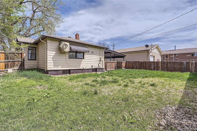 4835 Harlan St, Wheat Ridge, CO 80033 - back of house with a chimney