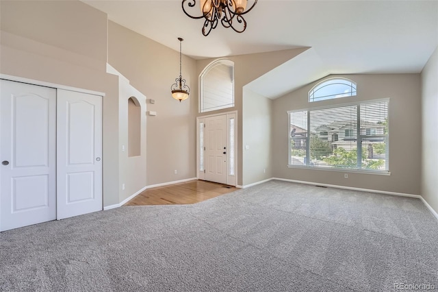 22436 E Maplewood Pl, Aurora, CO 80015 - entryway with a chandelier, carpet, and lofted ceiling