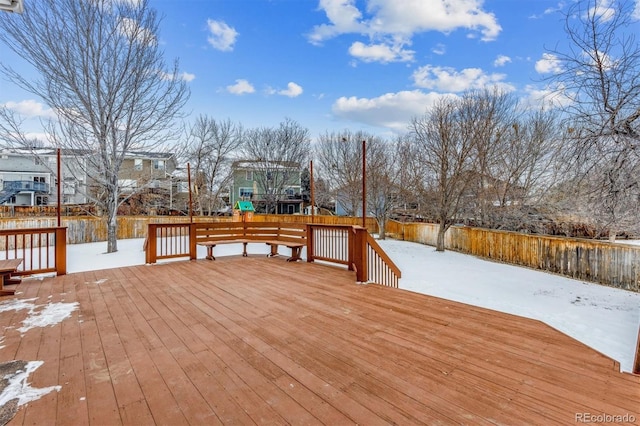 view of snow covered deck