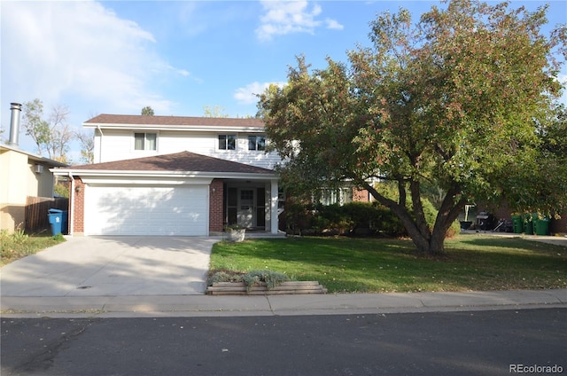 8450 Mason Cir, Westminster, CO 80031 - traditional home with a front lawn, a garage, driveway, and brick siding
