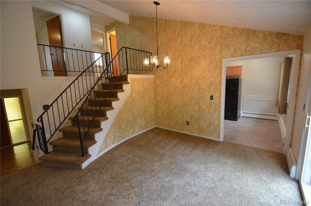 8450 Mason Cir, Westminster, CO 80031 - stairway featuring a baseboard heating unit, carpet floors, a chandelier, baseboards, and tile patterned floors
