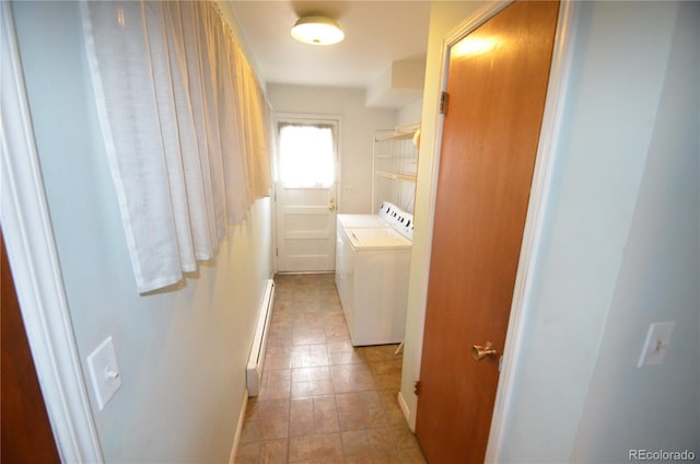 8450 Mason Cir, Westminster, CO 80031 - corridor featuring baseboard heating, independent washer and dryer, baseboards, and light tile patterned floors