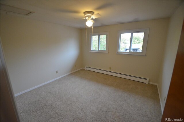 8450 Mason Cir, Westminster, CO 80031 - unfurnished room featuring a baseboard radiator, carpet, baseboards, and ceiling fan