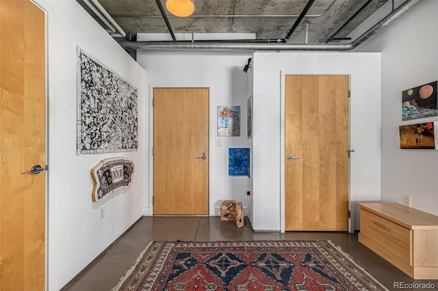 corridor with finished concrete flooring