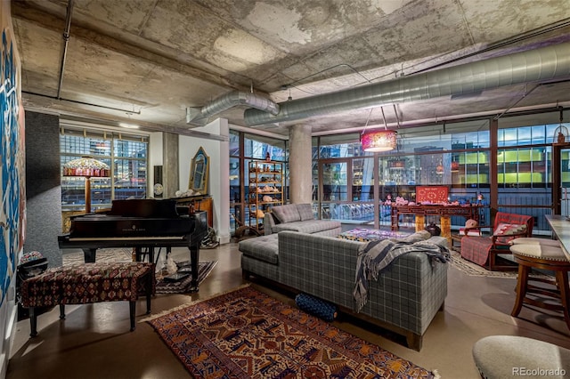 living room with finished concrete flooring