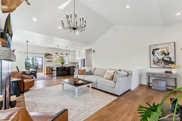 372 Park View Dr, Fairplay, CO 80440 - living area with high vaulted ceiling, light wood finished floors, recessed lighting, and a chandelier