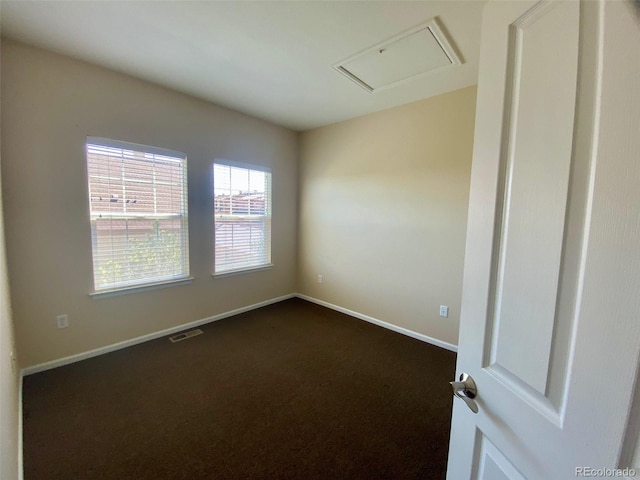 view of carpeted spare room