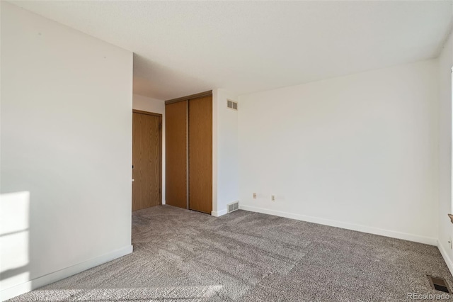 empty room with carpet floors