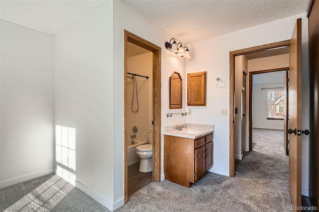 full bathroom with vanity,  shower combination, toilet, and a textured ceiling