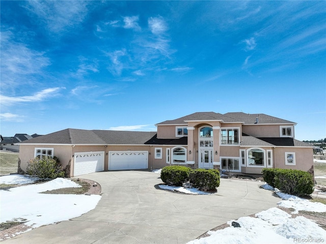 view of front of home with a garage