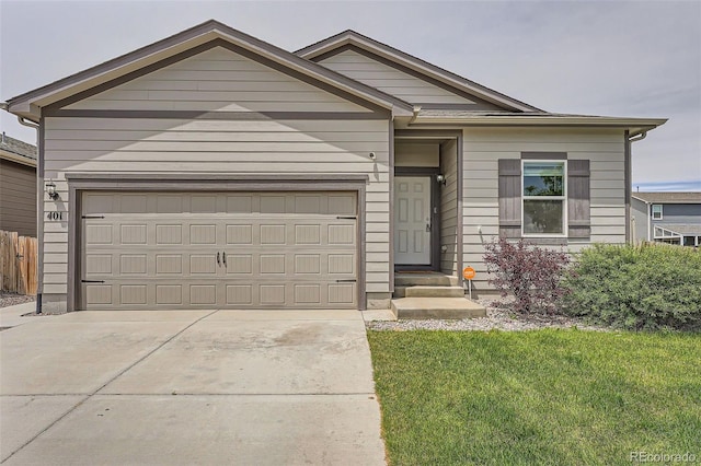 401 Quincy Rr Ave, Keenesburg, CO 80643 - ranch-style home with concrete driveway and an attached garage
