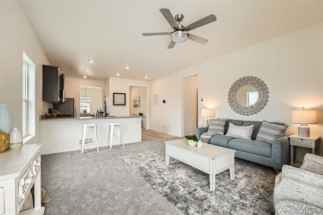 401 Quincy Rr Ave, Keenesburg, CO 80643 - living room with ceiling fan, recessed lighting, and light carpet