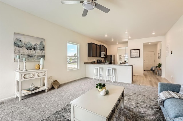 401 Quincy Rr Ave, Keenesburg, CO 80643 - living area featuring ceiling fan, recessed lighting, light colored carpet, and baseboards