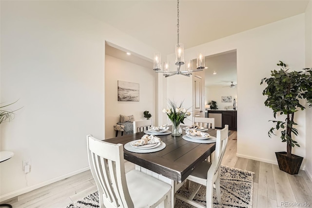 401 Quincy Rr Ave, Keenesburg, CO 80643 - dining area featuring a chandelier, light wood-type flooring, recessed lighting, and baseboards