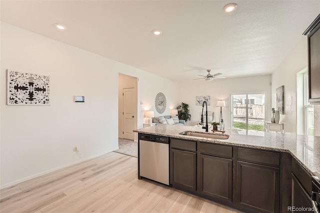 401 Quincy Rr Ave, Keenesburg, CO 80643 - kitchen featuring stainless steel dishwasher, a sink, light wood-style floors, light stone counters, and ceiling fan