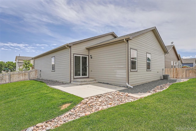 401 Quincy Rr Ave, Keenesburg, CO 80643 - back of property with a patio and central AC