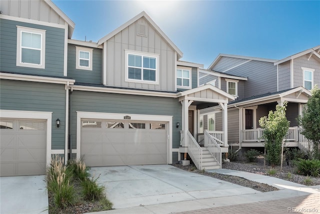 view of front facade featuring a garage and covered porch