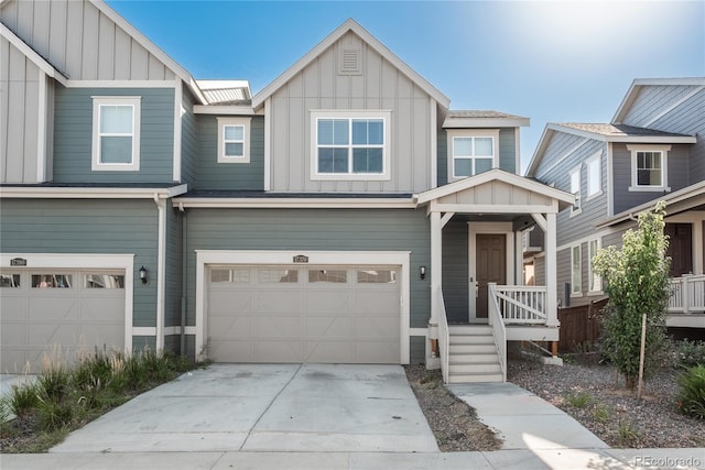 view of front of house with a garage and a porch