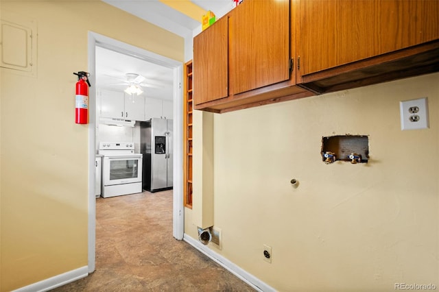 clothes washing area featuring ceiling fan