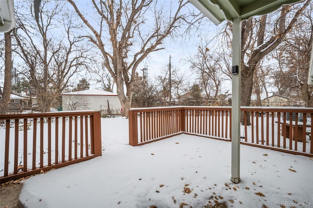 view of snow covered deck