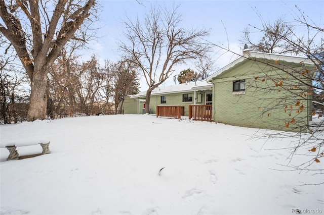 view of yard covered in snow