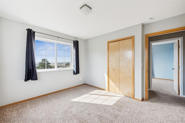 2541 Hot Springs Ct, Colorado Springs, CO 80919 - unfurnished bedroom with baseboards, carpet flooring, and a closet