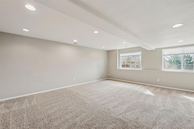 2541 Hot Springs Ct, Colorado Springs, CO 80919 - empty room with baseboards, recessed lighting, beamed ceiling, and carpet