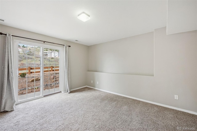 2541 Hot Springs Ct, Colorado Springs, CO 80919 - spare room with baseboards, carpet flooring, and visible vents