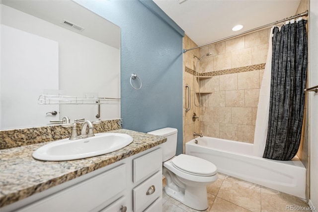 2541 Hot Springs Ct, Colorado Springs, CO 80919 - full bath featuring tile patterned floors, vanity, toilet, visible vents, and shower / bath combination with curtain