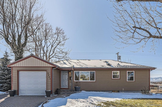 single story home with a garage