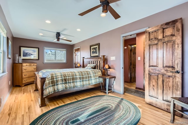 bedroom featuring ceiling fan and light hardwood / wood-style flooring