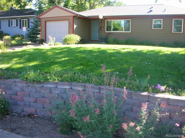 single story home with a garage and a front yard