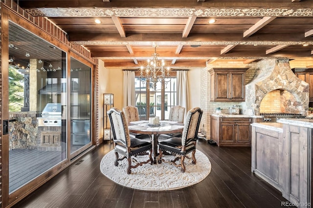 dining area featuring an inviting chandelier, beam ceiling, dark wood-type flooring, and coffered ceiling