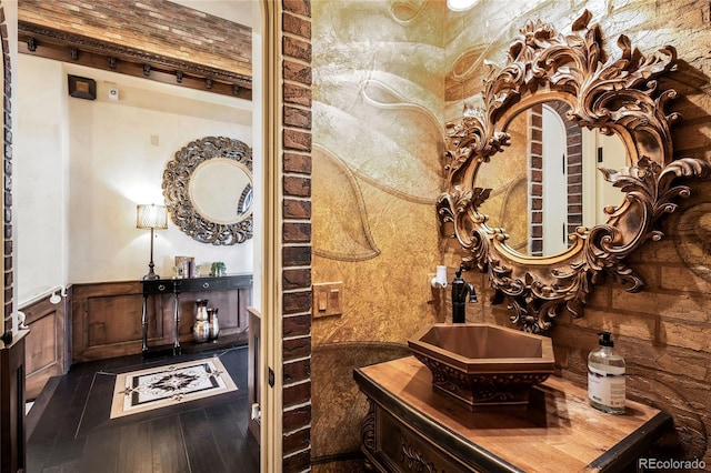 bathroom with wood-type flooring and vanity