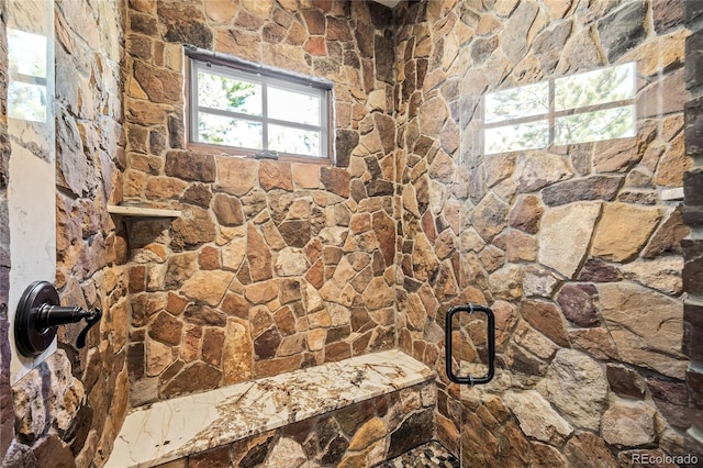 bathroom featuring an enclosed shower