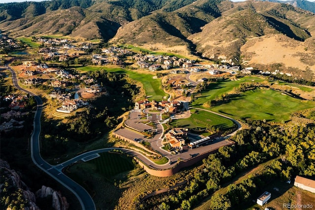 birds eye view of property with a mountain view