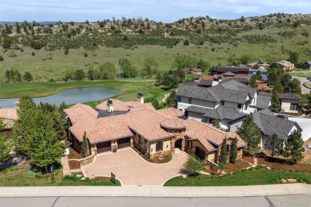 7188 Raphael Ln, Littleton, CO 80125 - view of subject property with a nearby body of water and a local golf course