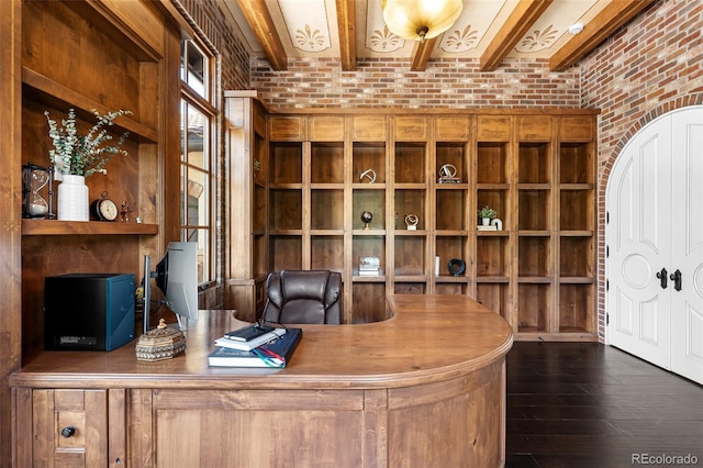 7188 Raphael Ln, Littleton, CO 80125 - home office featuring brick wall, beam ceiling, and dark wood-type flooring