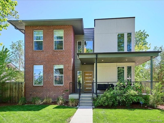 2508 S Pennsylvania St, Denver, CO 80210 - view of front facade with a porch