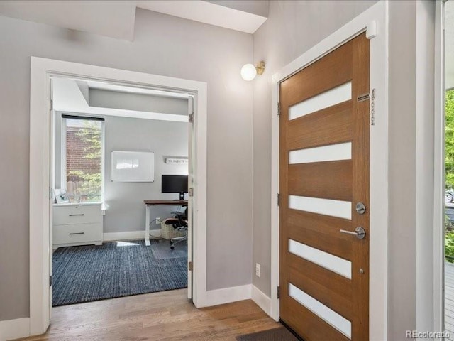 2508 S Pennsylvania St, Denver, CO 80210 - foyer featuring wood finished floors and baseboards