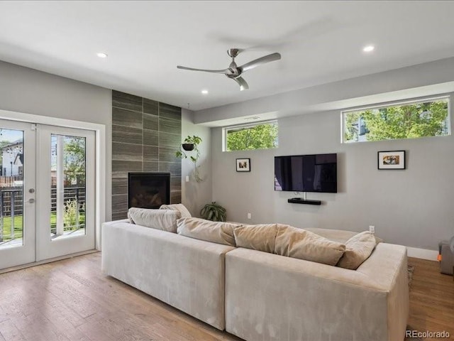 2508 S Pennsylvania St, Denver, CO 80210 - living room featuring ceiling fan, recessed lighting, wood finished floors, french doors, and a large fireplace