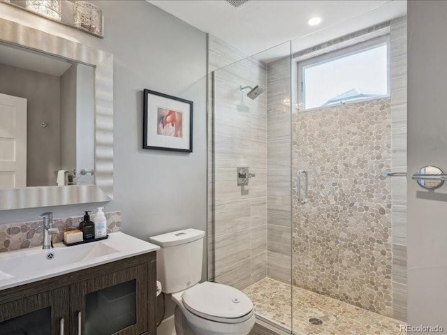 2508 S Pennsylvania St, Denver, CO 80210 - full bath with a shower stall, toilet, and vanity