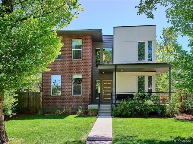 2508 S Pennsylvania St, Denver, CO 80210 - view of front facade featuring a porch