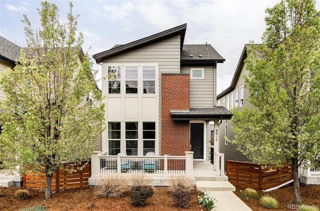 8917 Yates Dr, Westminster, CO 80031 - view of front facade with a shingled roof