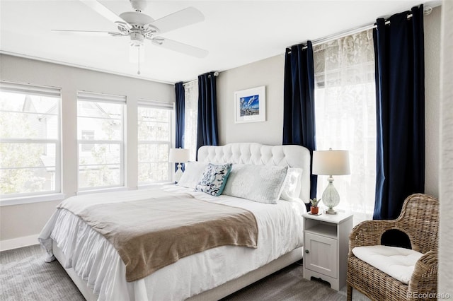8917 Yates Dr, Westminster, CO 80031 - bedroom featuring multiple windows, baseboards, ceiling fan, and carpet