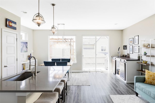 8917 Yates Dr, Westminster, CO 80031 - dining space featuring dark wood-style flooring, plenty of natural light, baseboards, and recessed lighting